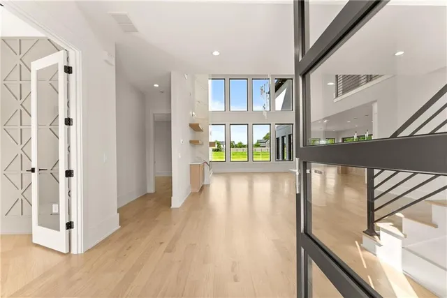 a view of an empty room with a window