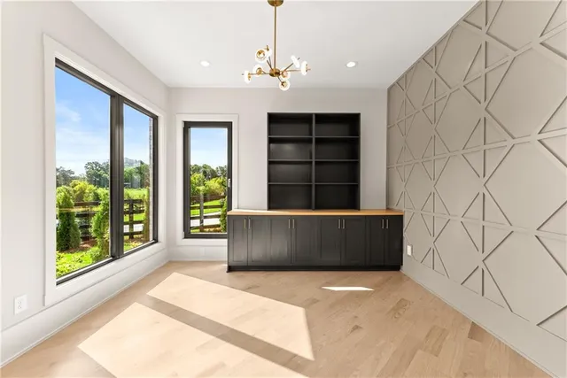 an empty room with a empty space and window