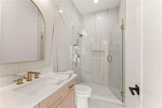 a spacious bathroom with a double vanity sink mirror and double