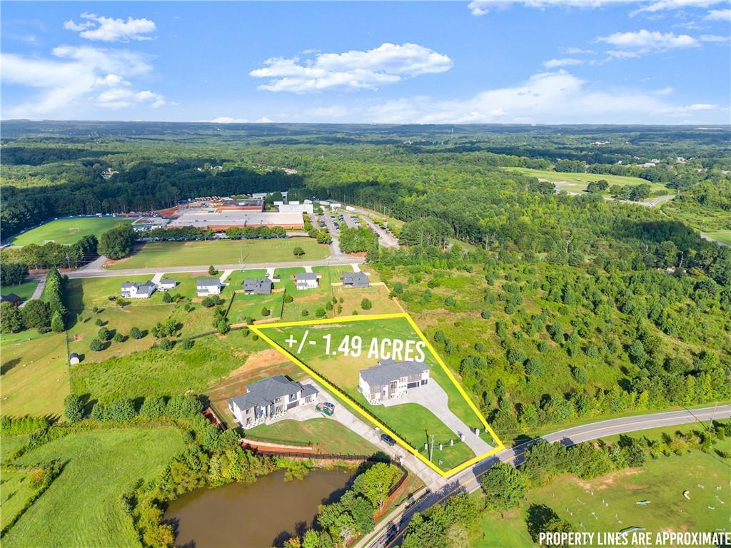 2021 Jones Phillips Road Dacula, GA 30019 - Photo 63 of 65 a view of a city