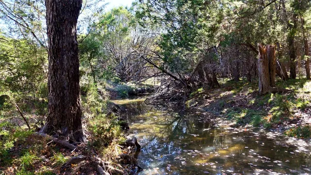 a view of outdoor space with a lake view