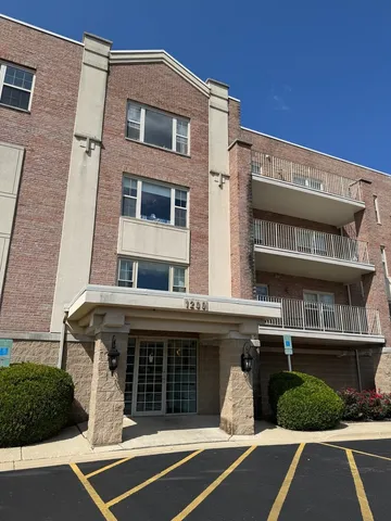 a view of a building with car windows