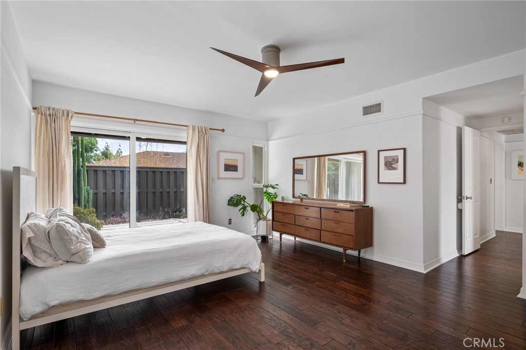 1863 Antioch Road Claremont, CA 91711 - Photo 17 of 46 a bedroom with a bed and wooden floor