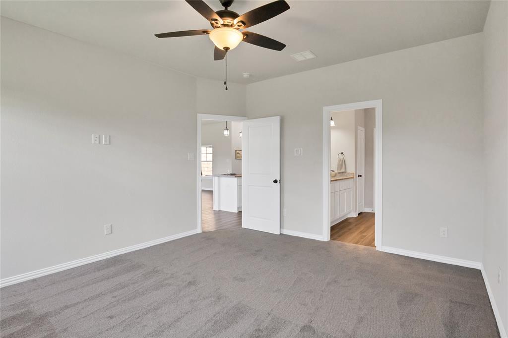 115 Panther Loop Mabank, TX 75147 - Photo 15 of 29 Ceiling fans in all bedrooms. Carpet is standard in bedrooms but you have choices there also!