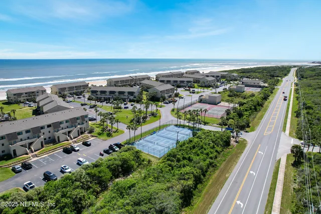 a view of a yard with an ocean