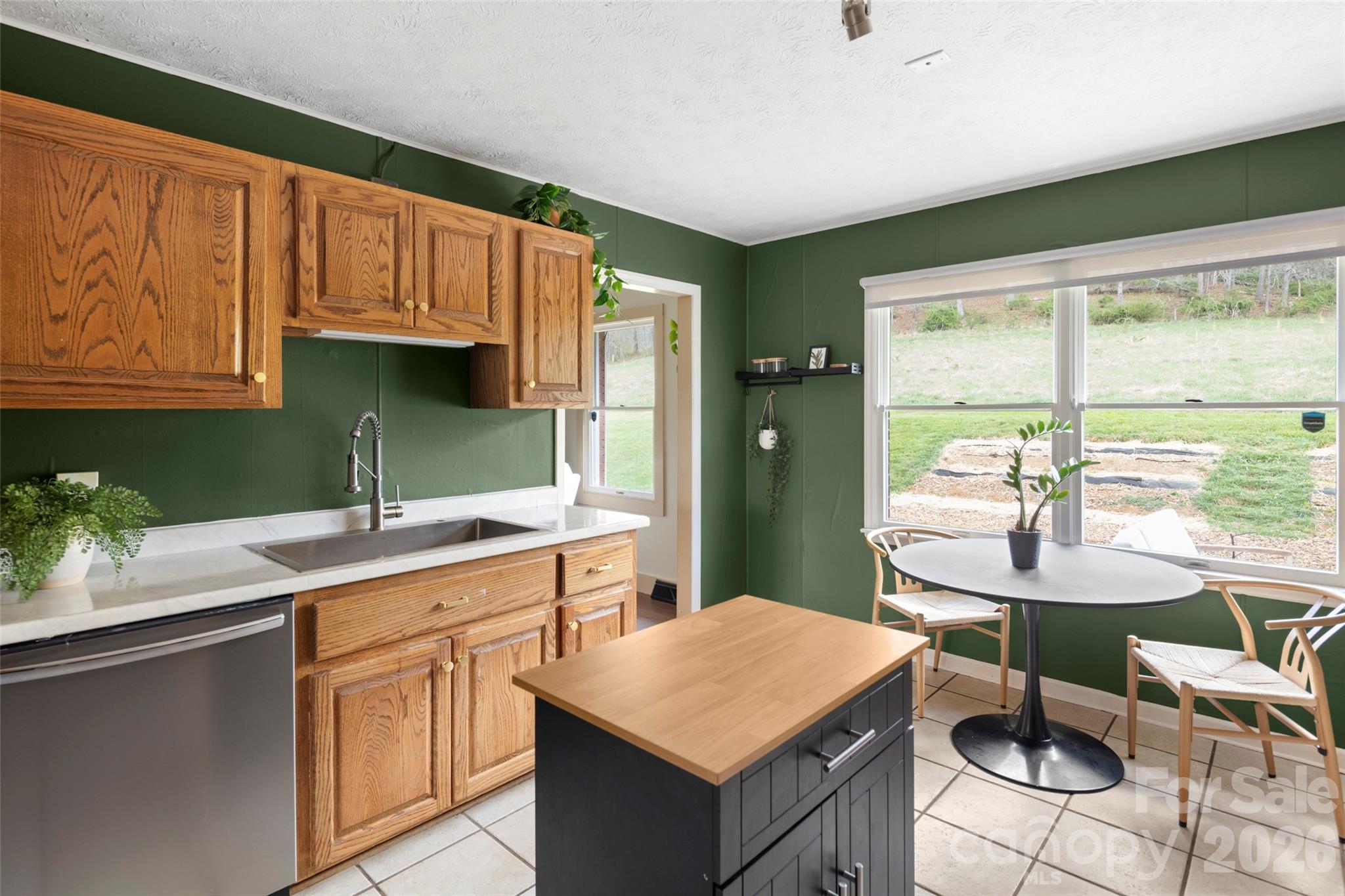 17 Boyd Cove Road Leicester, NC 28748 - Photo 14 of 40 a kitchen with a sink cabinets and wooden floor