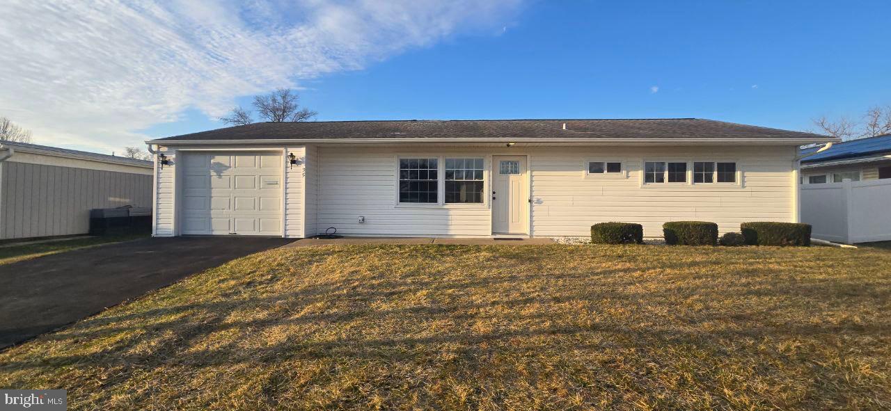 a house view with a garden space