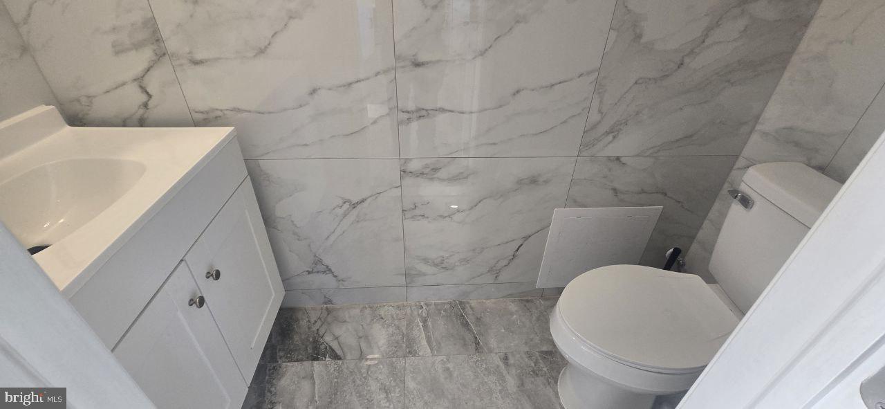 35 Beechtree Road Levittown, PA 19057 - Photo 11 of 20 a bathroom with a sink and toilet