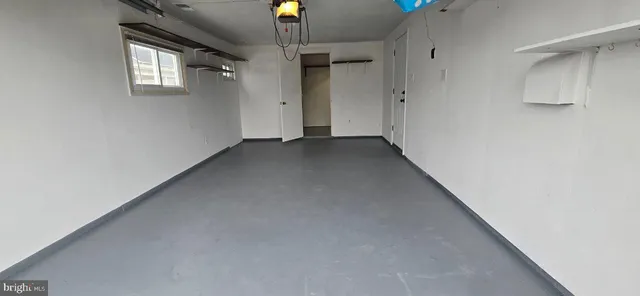 a view of a hallway with a window