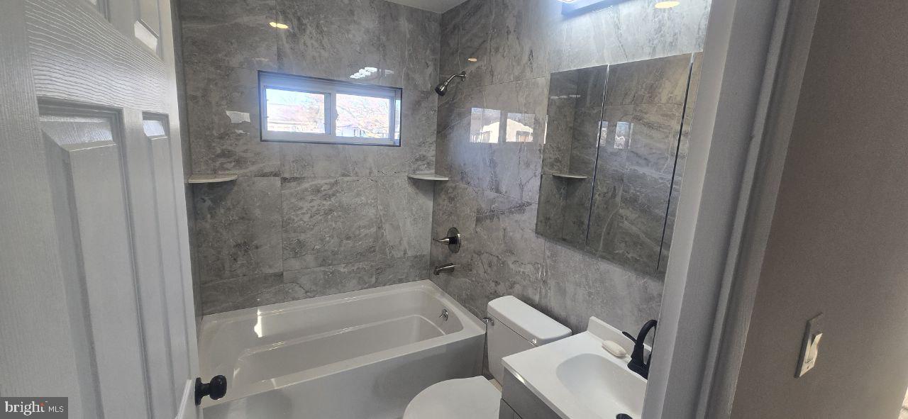 35 Beechtree Road Levittown, PA 19057 - Photo 10 of 20 a bathroom with a sink toilet and shower