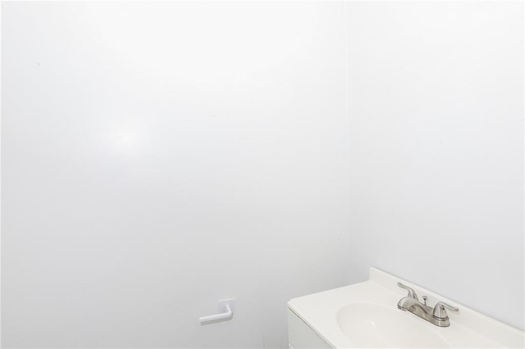 1678 Bagpipe Place Conley, GA 30288 - Photo 13 of 16 a bathroom with a sink