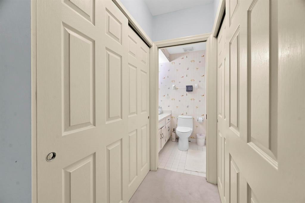 1171 North Ocean Boulevard, Unit 1A N Delray Beach, FL 33483 - Photo 30 of 41 a bathroom with a sink and a toilet