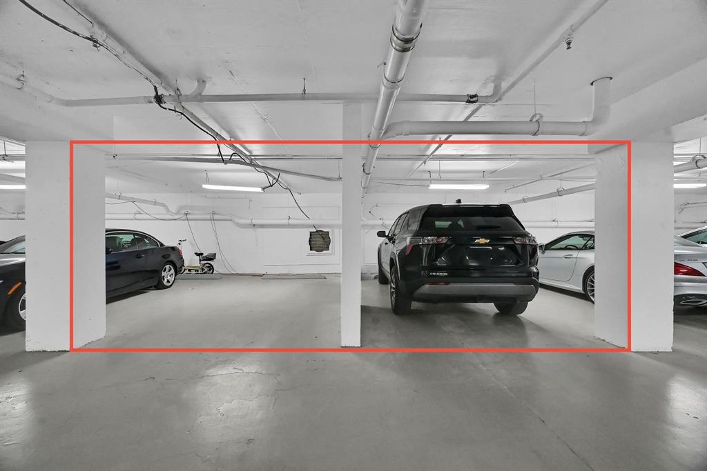 1171 North Ocean Boulevard, Unit 1A N Delray Beach, FL 33483 - Photo 41 of 41 a car parked in a garage