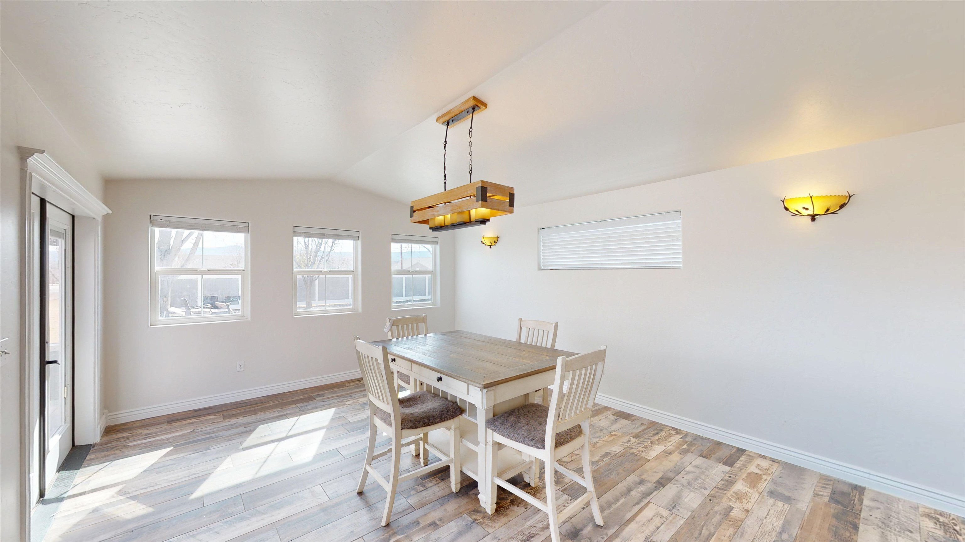 1166-17 17 1/2 Road Fruita, CO 81521 - Photo 11 of 42 a dining room with furniture and window