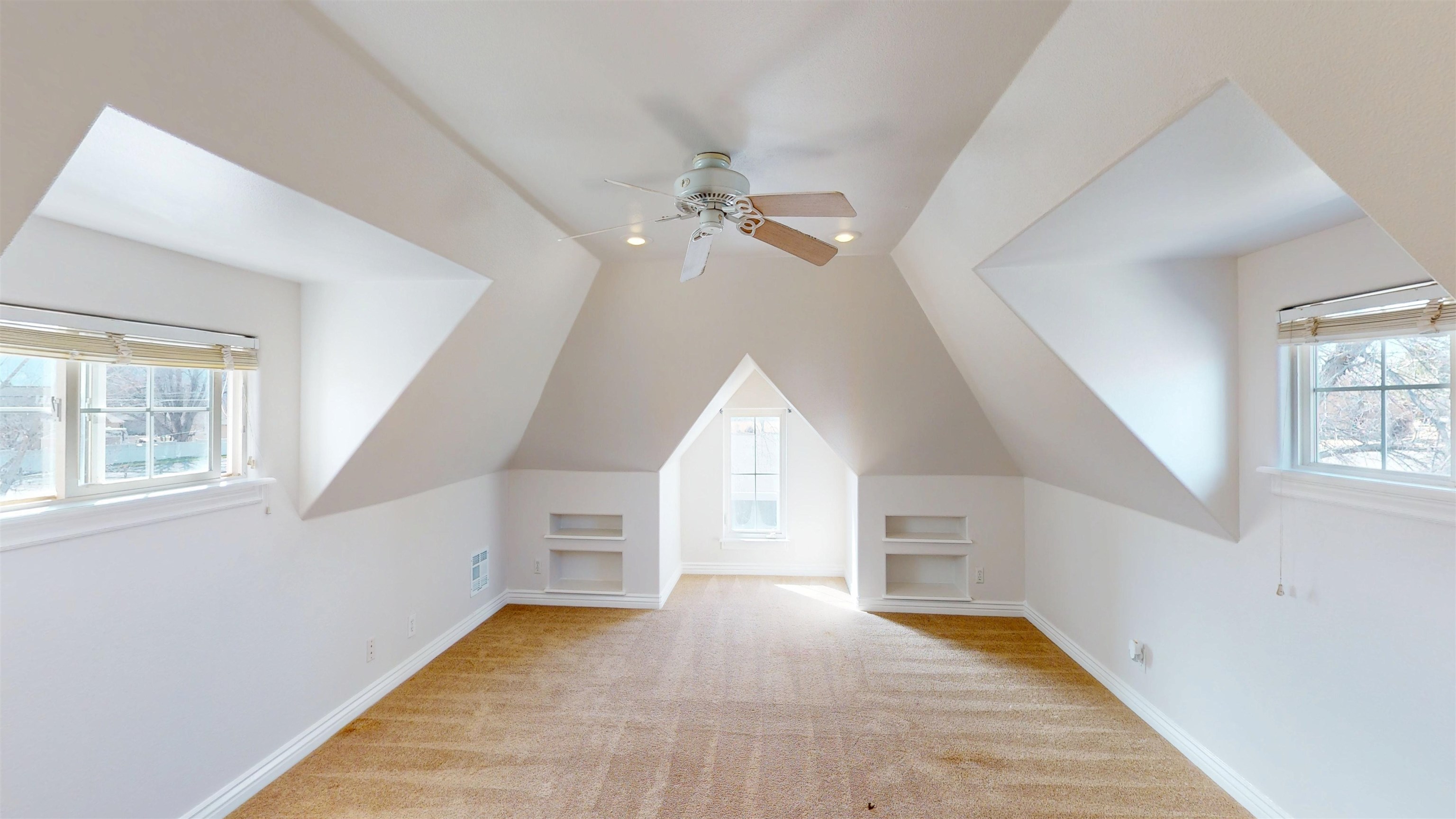 1166-17 17 1/2 Road Fruita, CO 81521 - Photo 22 of 42 wooden floor in an empty room with a window