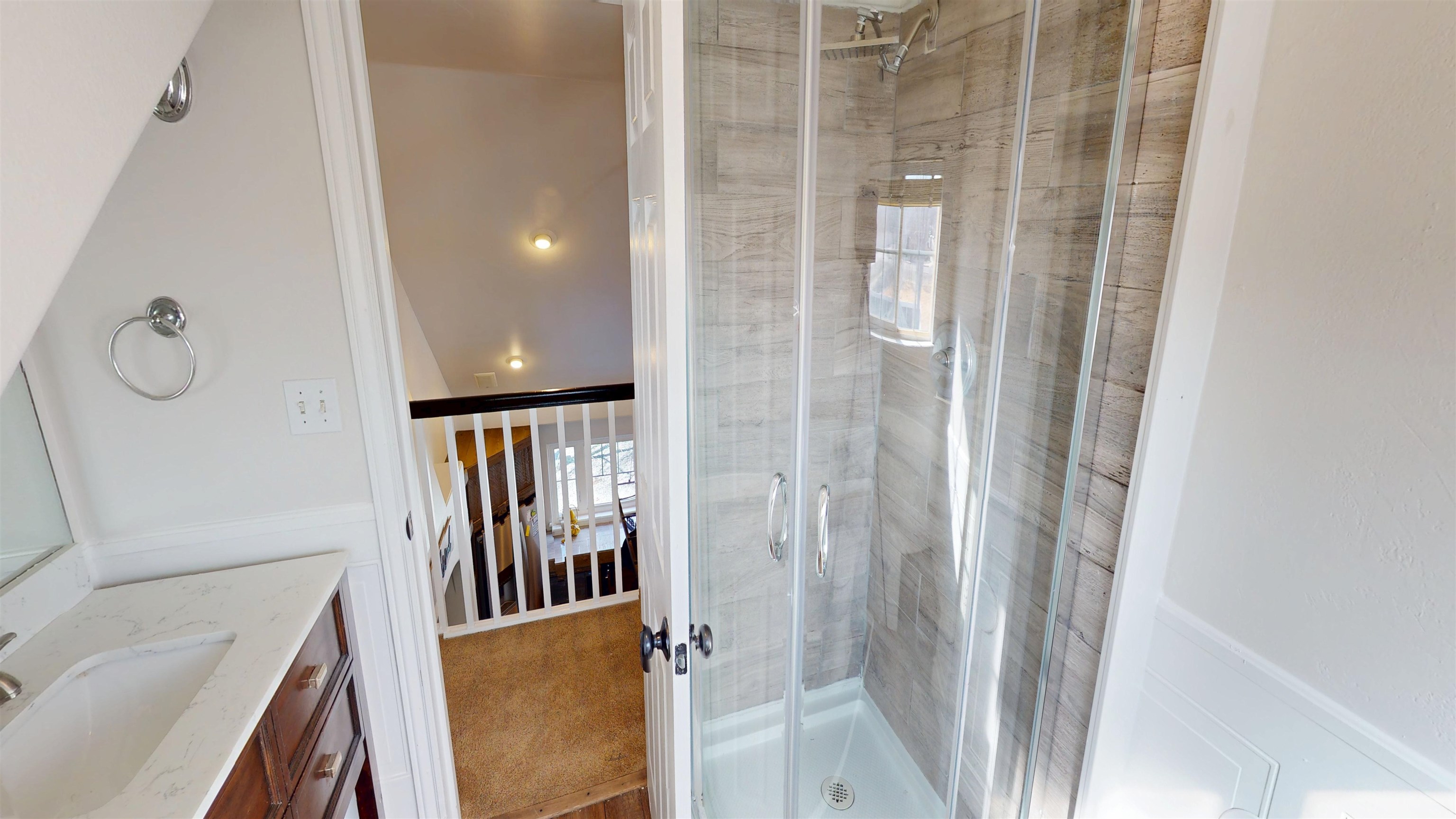 1166-17 17 1/2 Road Fruita, CO 81521 - Photo 24 of 42 a view of a livingroom with wooden floor and stairs