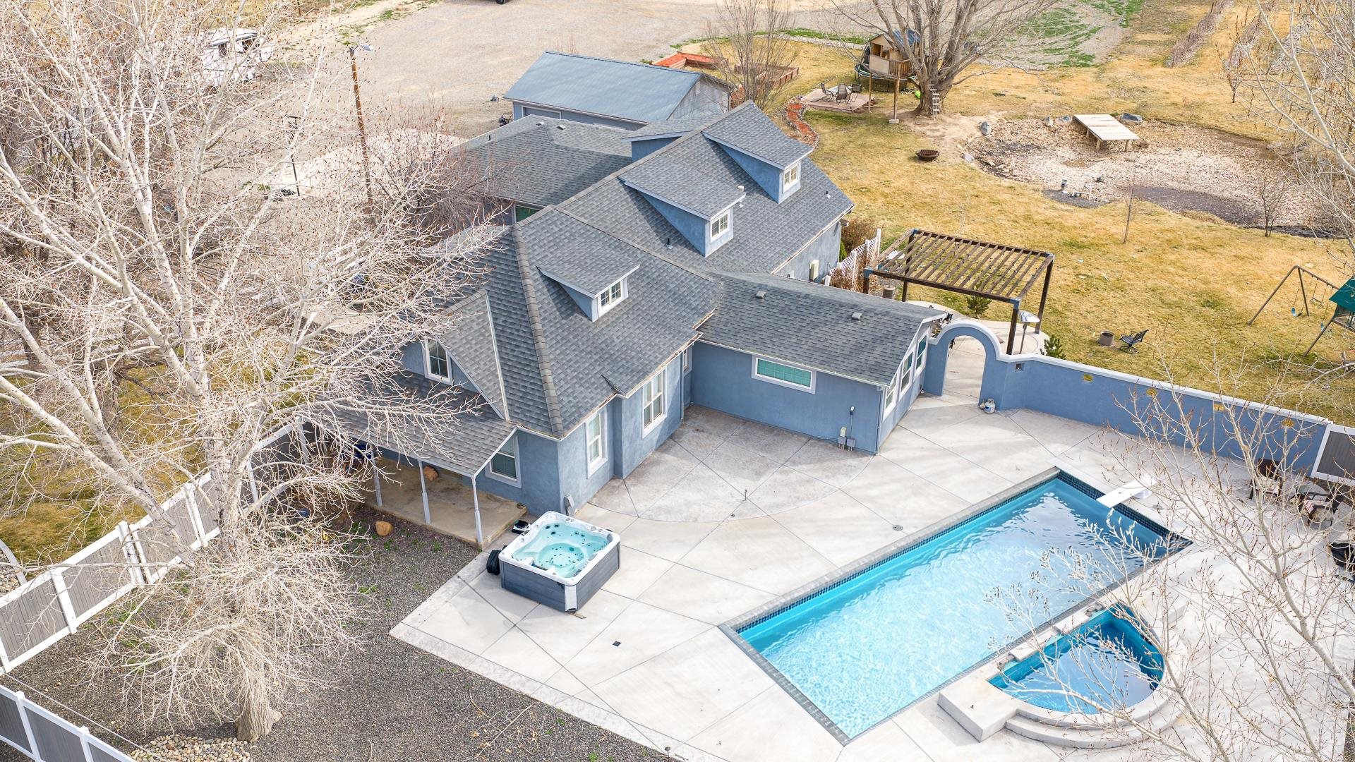1166-17 17 1/2 Road Fruita, CO 81521 - Photo 31 of 42 a view of a house with a backyard