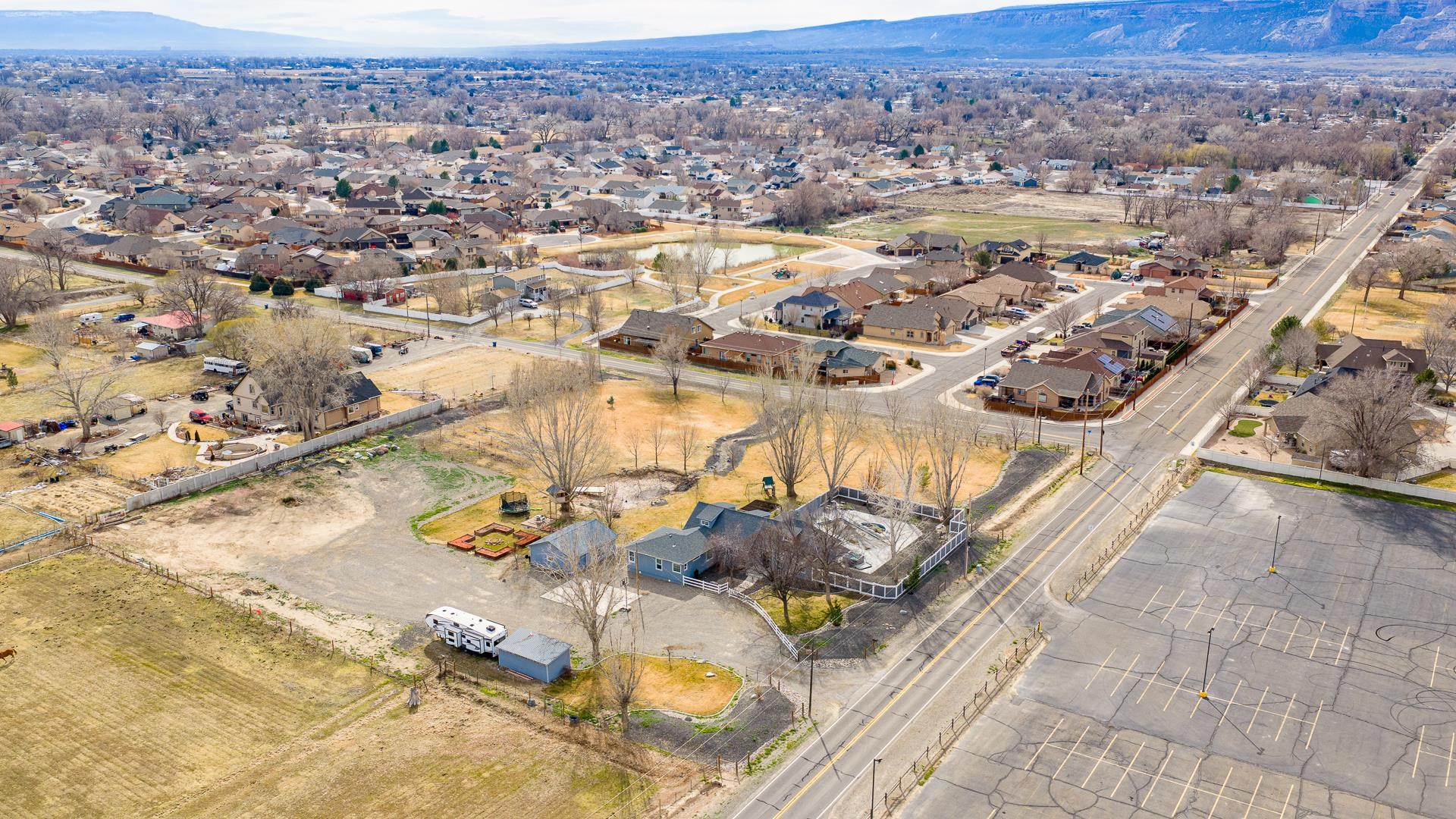 1166-17 17 1/2 Road Fruita, CO 81521 - Photo 32 of 42 an aerial view of residential houses with outdoor space