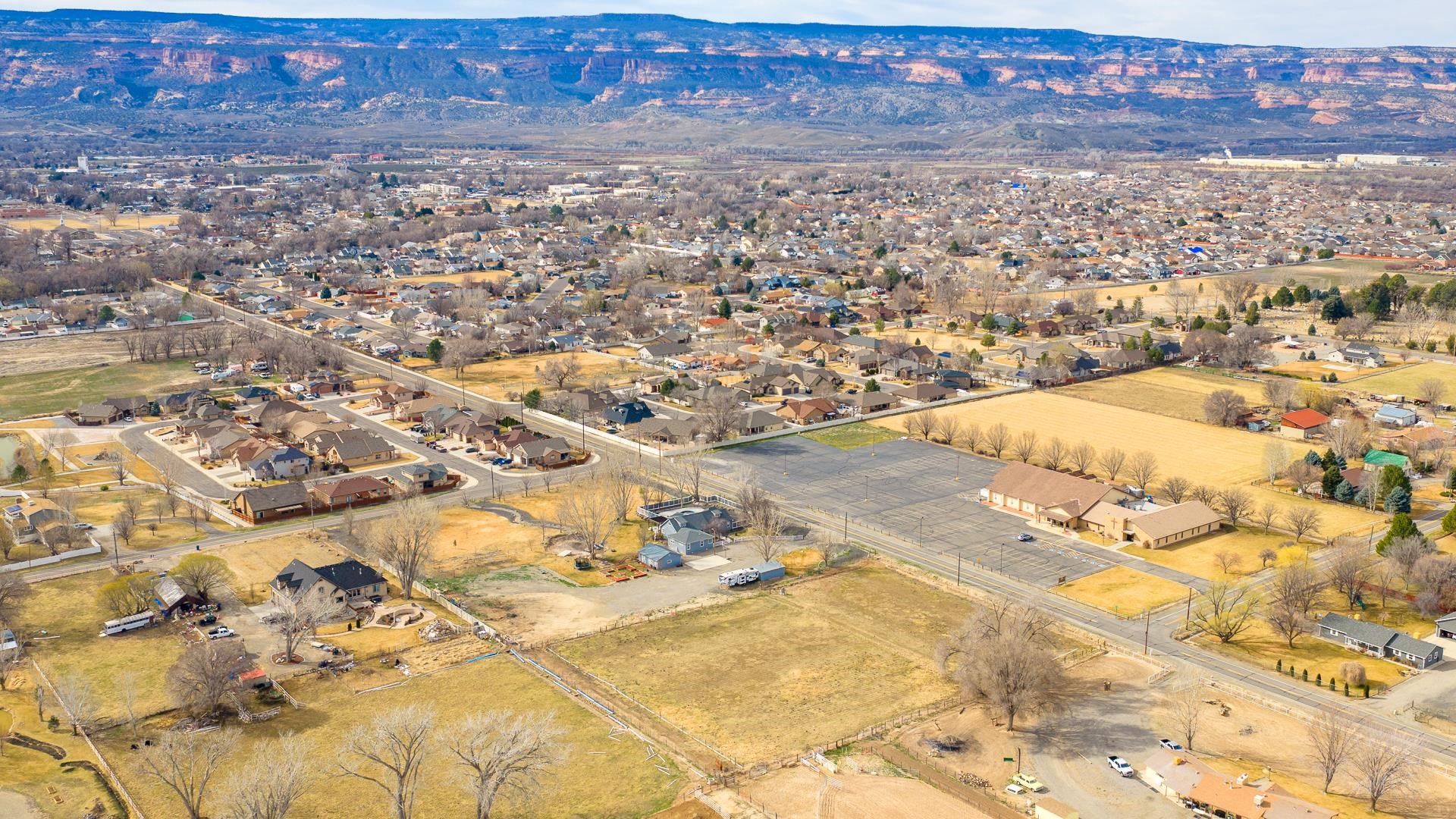 1166-17 17 1/2 Road Fruita, CO 81521 - Photo 35 of 42 an aerial view of residential houses with yard