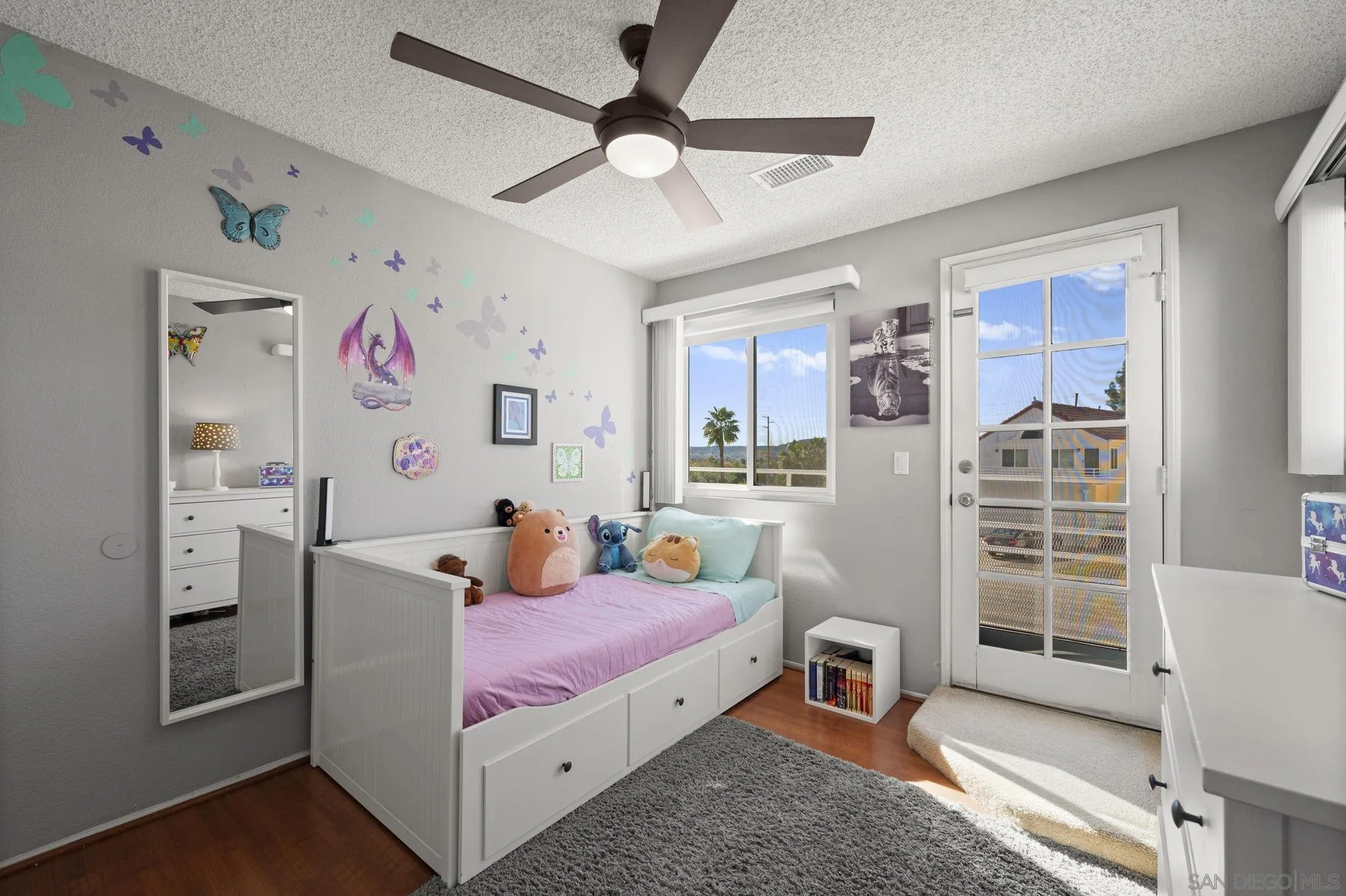 10503 Flora Azalea Court Santee, CA 92071 - Photo 19 of 33 a bedroom with a bed and a window