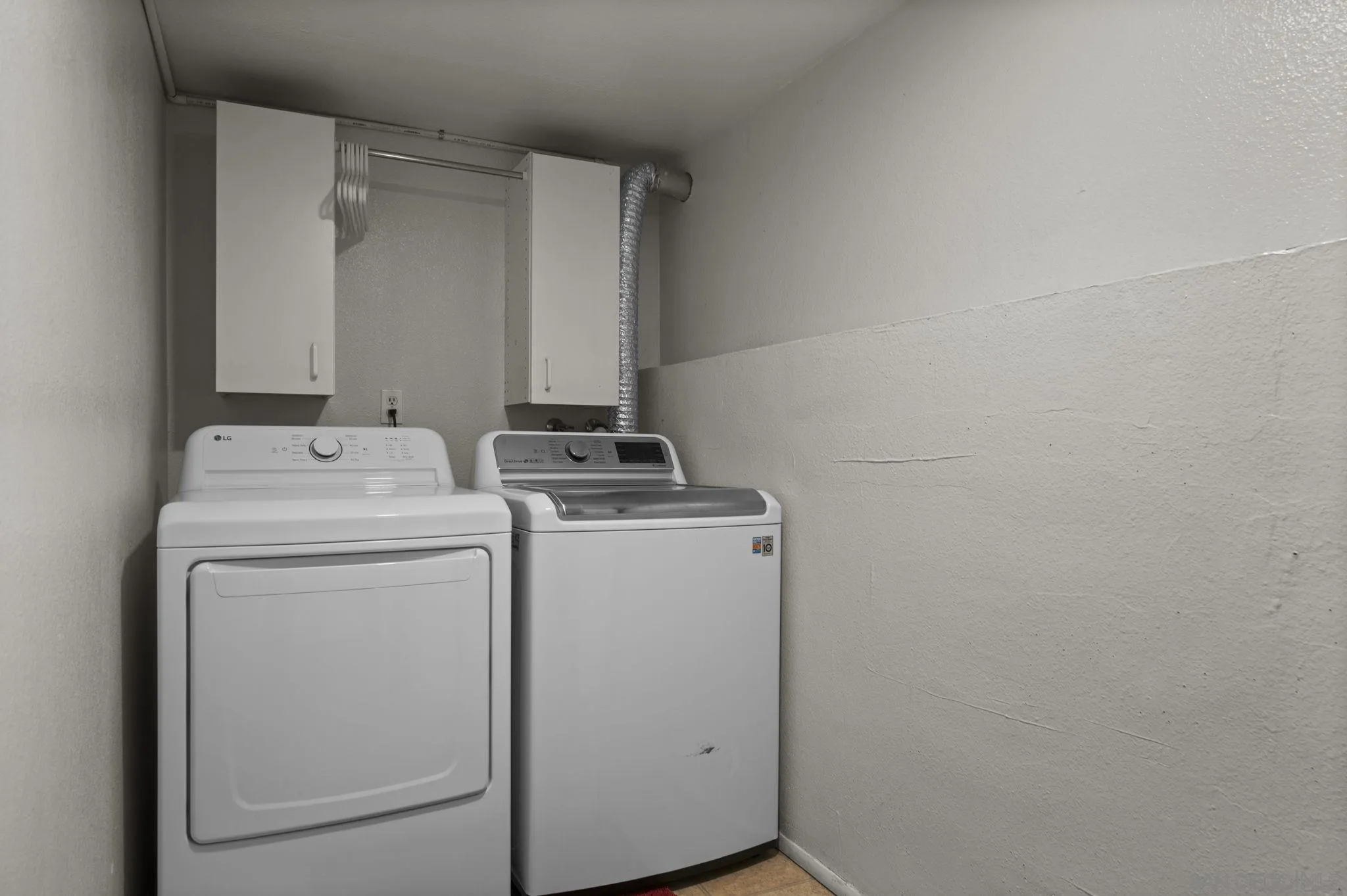 10503 Flora Azalea Court Santee, CA 92071 - Photo 31 of 33 a utility room with dryer and washer