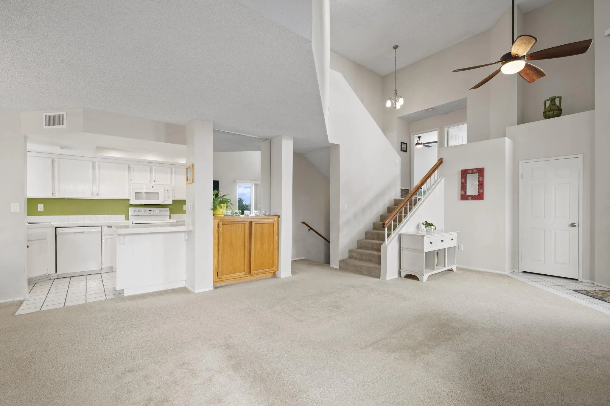 10503 Flora Azalea Court Santee, CA 92071 - Photo 5 of 33 a view of a kitchen with furniture and staircase