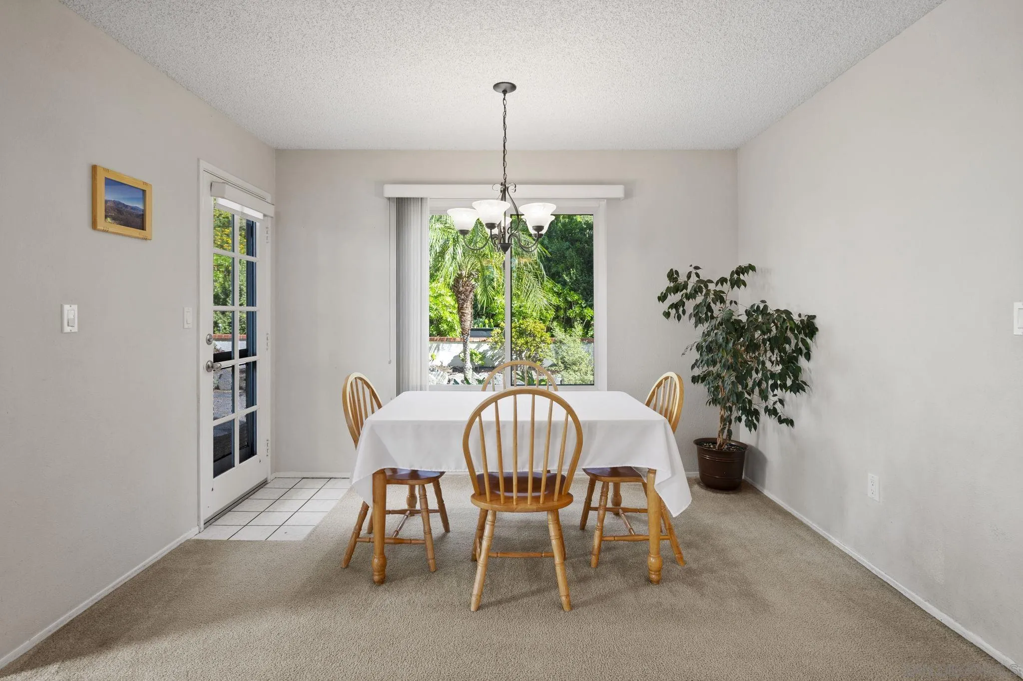10503 Flora Azalea Court Santee, CA 92071 - Photo 6 of 33 a view of a dining room with furniture window and outside view