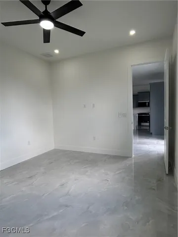 an empty room with windows