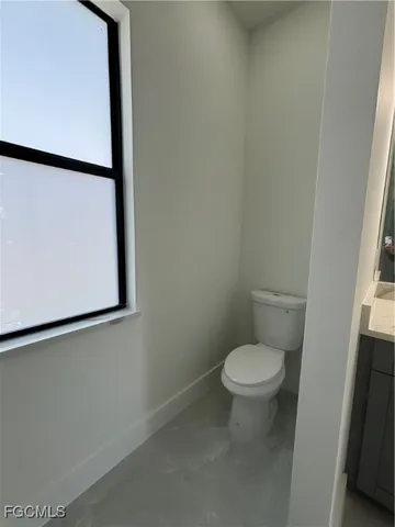 a view of a big room with a big yard and potted plants