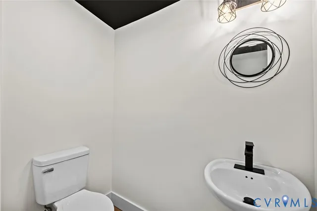 a bathroom with a sink and a toilet