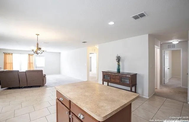 a bedroom with a bed and furniture