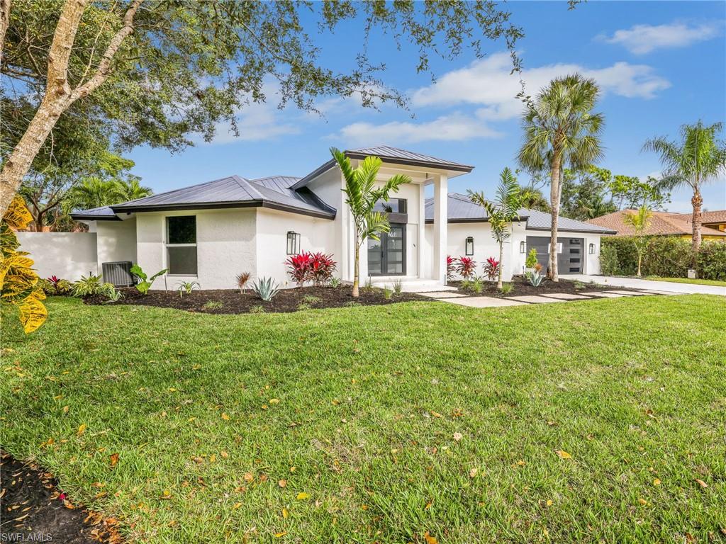 1803 Imperial Golf Course Boulevard Naples, FL 34110 - Photo 2 of 49