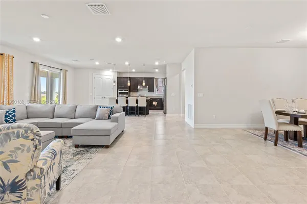 a bathroom with a sink and a window