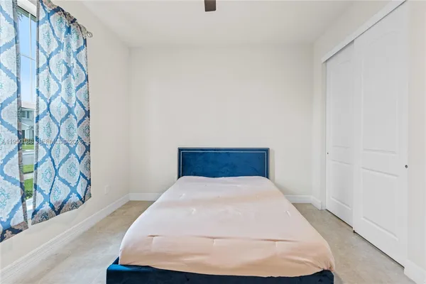 a workspace with furniture and window