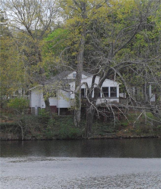 18 Echo Point Road Guilford, CT 06437 - Photo 1 of 1 a front view of a house with a yard