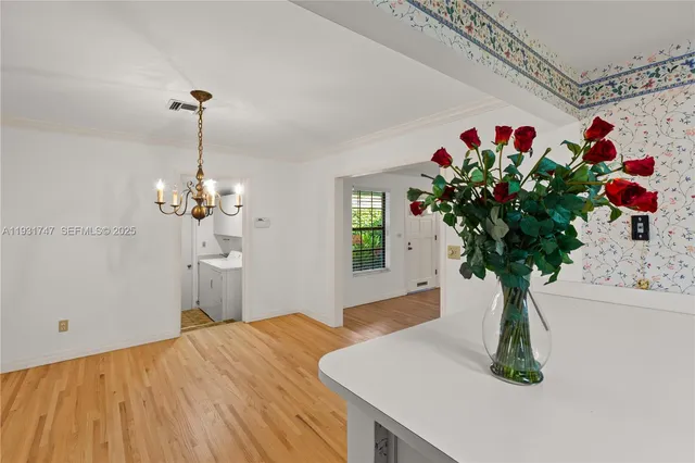 a vase of flowers sitting on a table