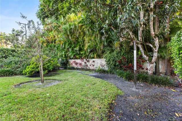 a house view with a garden space