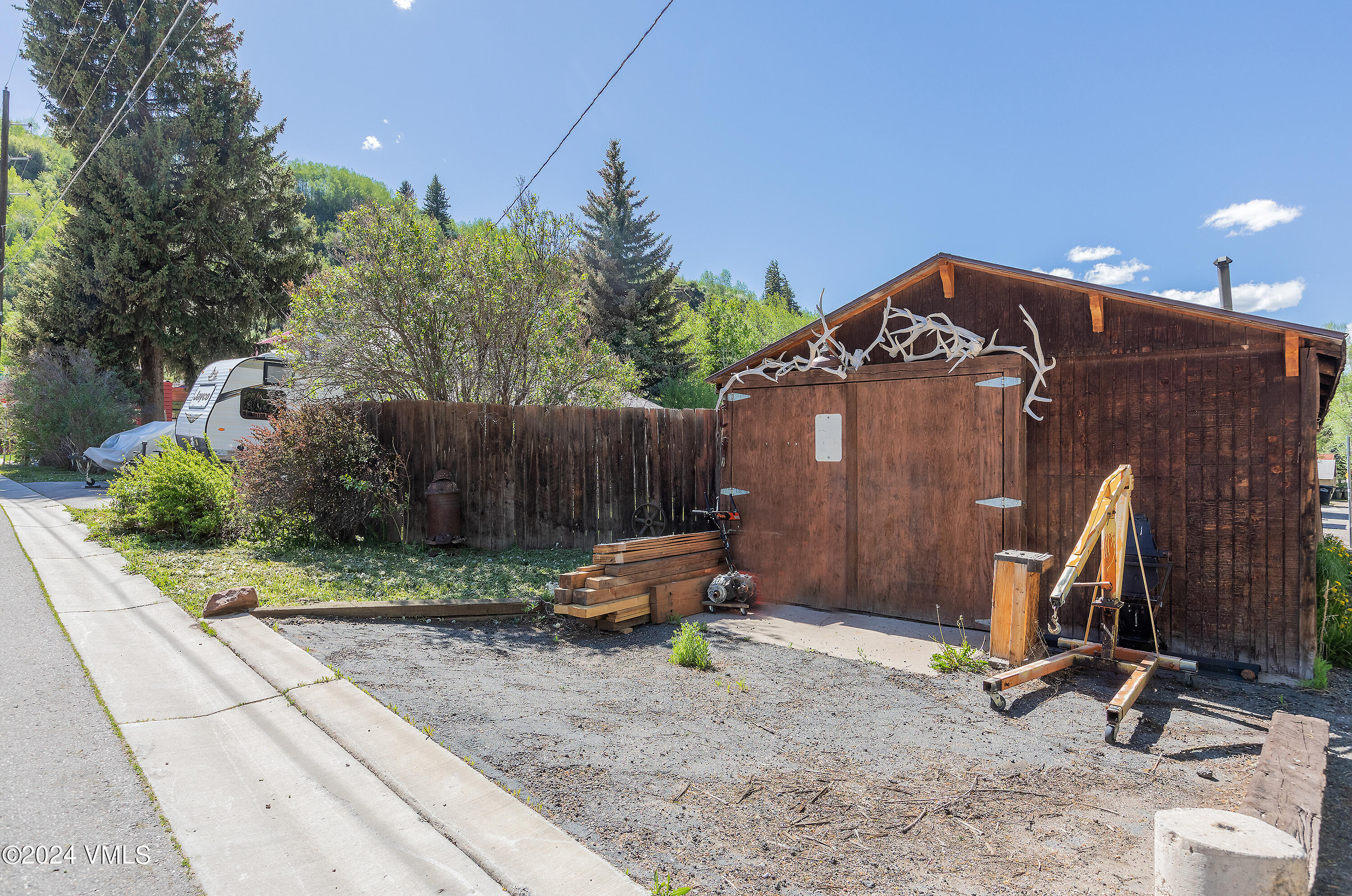 192 Main Street Minturn, CO 81645 - Photo 9 of 17 a view of backyard with wooden fence
