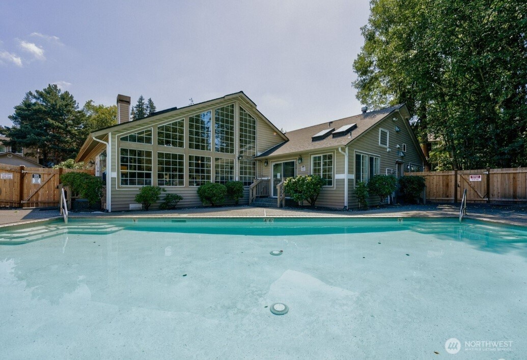11527 Highway 99, Unit C102 Everett, WA 98204 - Photo 12 of 15 a house view with a garden space