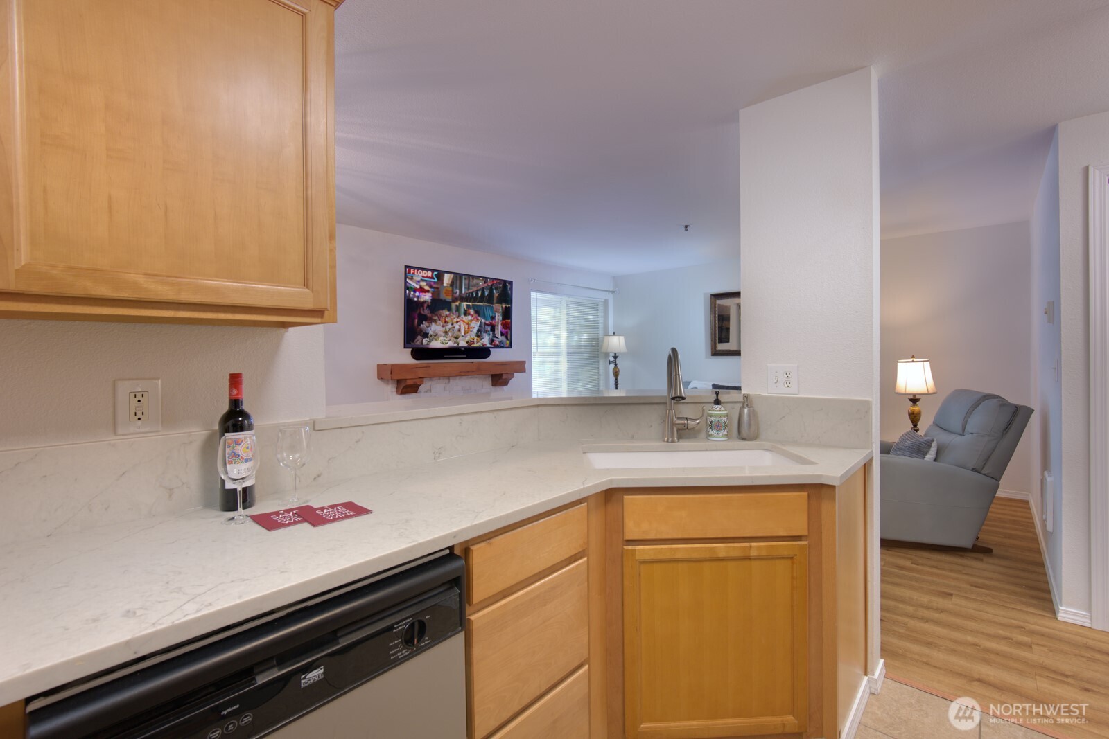 11527 Highway 99, Unit C102 Everett, WA 98204 - Photo 6 of 15 a kitchen with a sink and cabinets