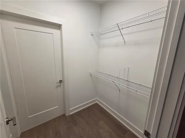a bathroom with a sink a window and tub