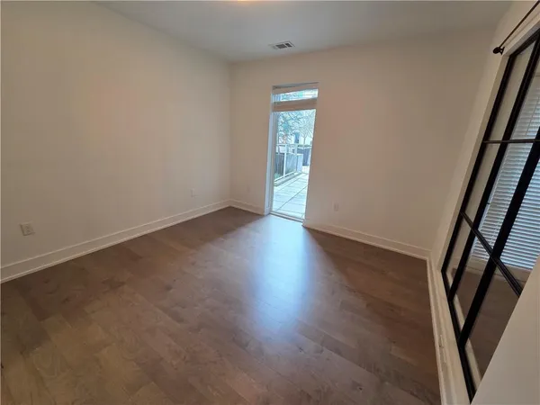 a view of an empty walk in closet