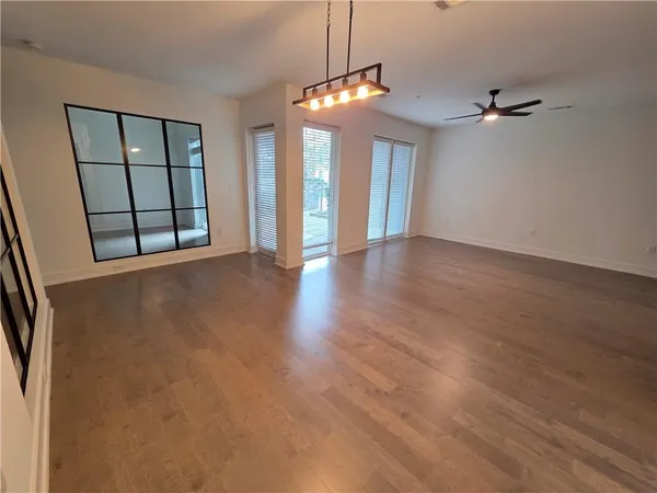 a kitchen with kitchen island a stove a sink and a refrigerator