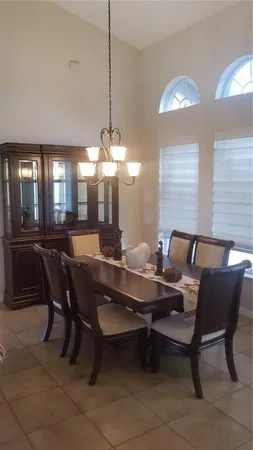 a view of a dining room with furniture
