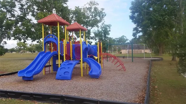 a view of a park with slide