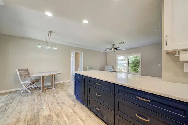 a living room with furniture and window