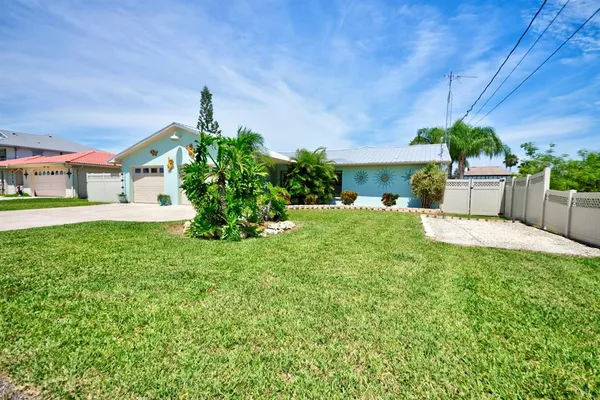 a house view with a garden space