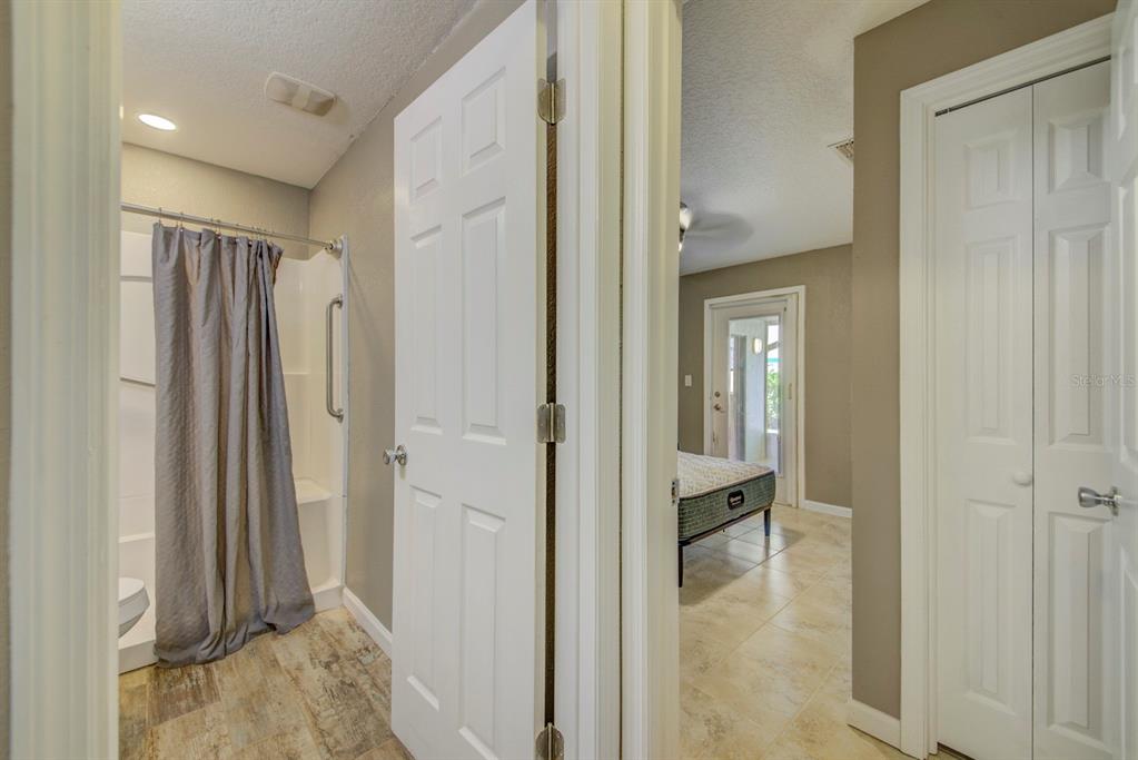 4266 Deleon Drive Hernando Beach, FL 34607 - Photo 32 of 65 a view of a bathroom from a hallway