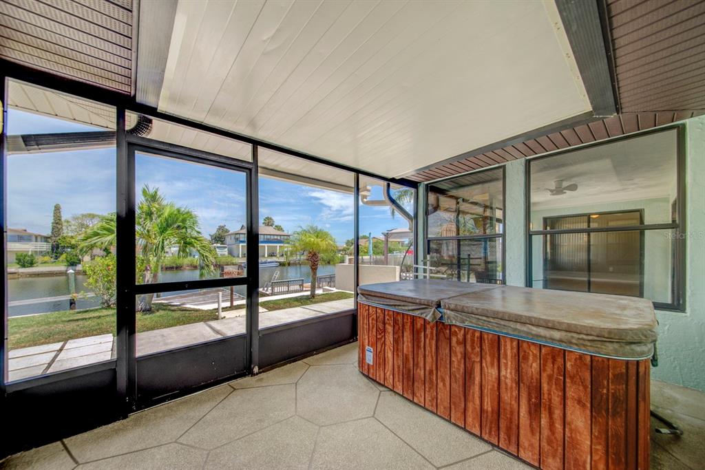 4266 Deleon Drive Hernando Beach, FL 34607 - Photo 39 of 65 a view of a large kitchen with a large window