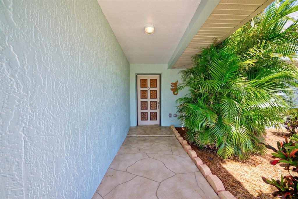 4266 Deleon Drive Hernando Beach, FL 34607 - Photo 4 of 65 a view of a house with a yard